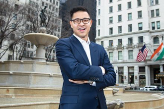 Happy graduate student with a certificate after graduation ceremony at the university. Christopher Rim aids students in finding the right college career path